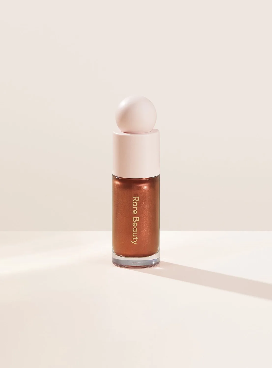 Positive Light Liquid Luminizer - Vloeibare highlighter 15 ml de Rare Beauty en Reflect – photo du produit