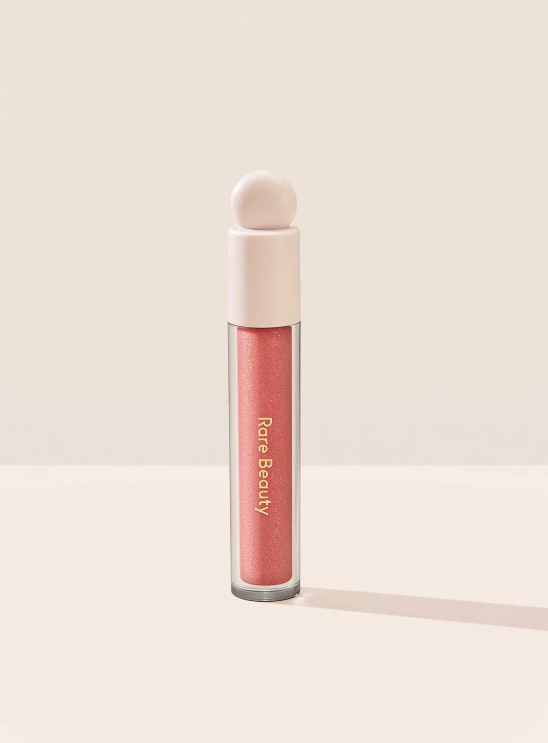 Positive Light Luminizing Lip Gloss - Lipgloss 3,3 ml by Rare Beauty in Beam – product photo