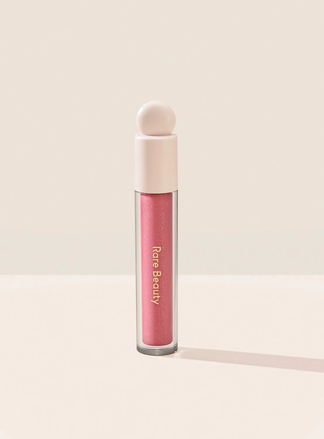 Positive Light Luminizing Lip Gloss - Lipgloss 3,3 ml van Rare Beauty in Flicker – productfoto