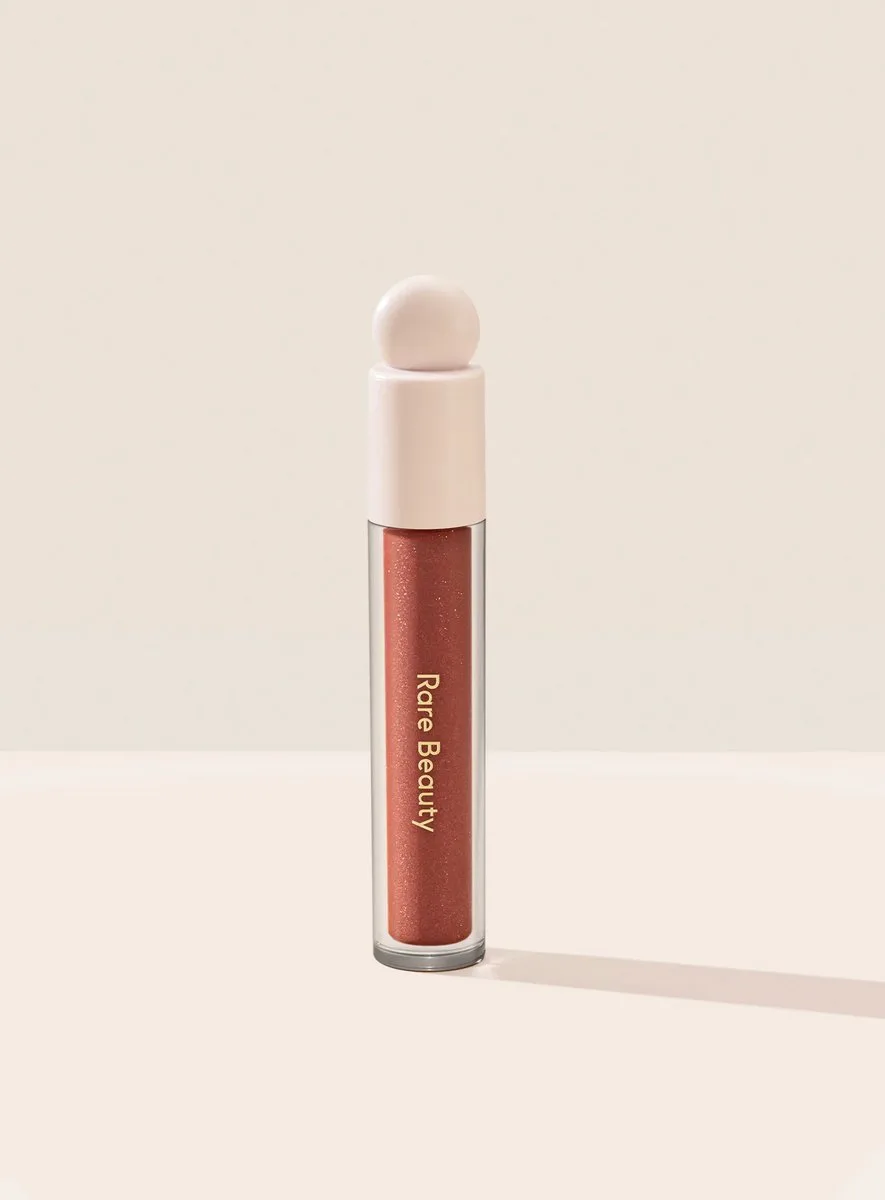Positive Light Luminizing Lip Gloss by Rare Beauty in Spark – product photo